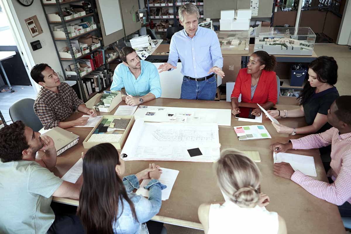 Greeen office design team meeting Our Design and Build Philosophy